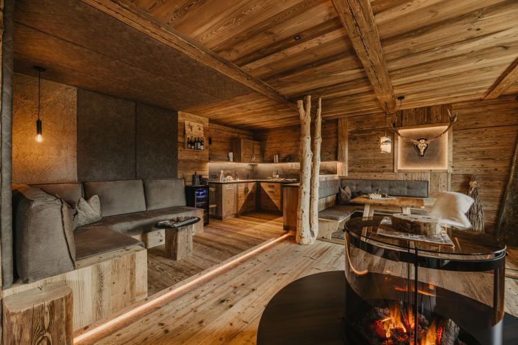 Antique wood and a fireplace provide an very warm atmosphere